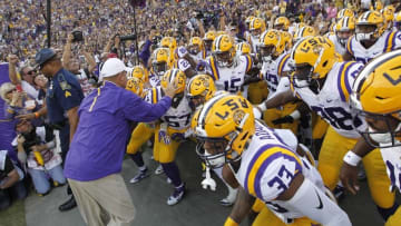 Oct 17, 2015; Baton Rouge, LA, USA; LSU Tigers head coach Les Miles leads the Tigers onto the field prior to kickoff against the Florida Gators at Tiger Stadium. The LSU Tigers defeated Florida 35-28. Mandatory Credit: Crystal LoGiudice-USA TODAY Sports