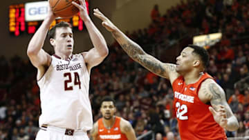 Feb 14, 2016; Chestnut Hill, MA, USA; Boston College Eagles center Dennis Clifford (24) holds the ball as Syracuse Orange center DaJuan Coleman (32) defends during the second half at Silvio O. Conte Forum. Mandatory Credit: Mark L. Baer-USA TODAY Sports