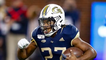 ATLANTA, GA - NOVEMBER 21: Jordan Mason #27 of the Georgia Tech Yellow Jackets rushes during the first half against the North Carolina State Wolfpack at Bobby Dodd Stadium on November 21, 2019 in Atlanta, Georgia. (Photo by Todd Kirkland/Getty Images)