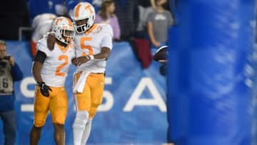 Tennessee quarterback Hendon Hooker (5) congratulates Tennessee running back Jabari Small (2) on a touchdown during an SEC football game between the Tennessee Volunteers and the Kentucky Wildcats at Kroger Field in Lexington, Ky. on Saturday, Nov. 6, 2021. Tennessee defeated Kentucky 45-42.Tennvskentucky1106 2183