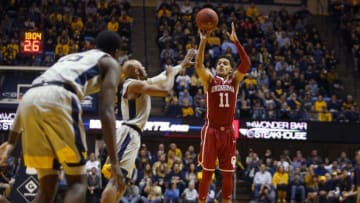 MORGANTOWN, WV - JANUARY 06: Trae Young #11 of the Oklahoma Sooners pulls up for three against the West Virginia Mountaineers at the WVU Coliseum on January 6, 2018 in Morgantown, West Virginia. (Photo by Justin K. Aller/Getty Images)