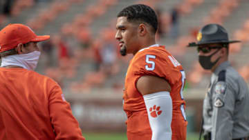 Oct 31, 2020; Clemson, SC, USA; Clemson head coach Dabo Swinney and quarterback D.J. Uiagalelei(5) walk off the field after the game against Boston College at Memorial Stadium. Mandatory Credit: Josh Morgan-USA TODAY Sports