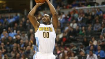 Oct 30, 2015; Denver, CO, USA; Denver Nuggets forward Darrell Arthur (00) shoots the ball during the second half against the Minnesota Timberwolves at Pepsi Center. The Timberwolves won 95-78. Mandatory Credit: Chris Humphreys-USA TODAY Sports