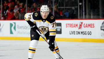 NEWARK, NJ - DECEMBER 31: Jeremy Lauzon #79 of the Boston Bruins waits for a face off during an NHL hockey game against the New Jersey Devils on December 31, 2019 at the Prudential Center in Newark, New Jersey. Devils won 3-2 in a shootout. (Photo by Paul Bereswill/Getty Images)