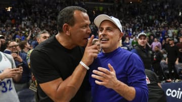 Apr 12, 2022; Minneapolis, Minnesota, USA; Minnesota Timberwolves co-minority owners Alex Rodriguez and Marc Lore celebrate a victory over the Los Angeles Clippers after a play-in game at Target Center. Mandatory Credit: Nick Wosika-USA TODAY Sports
