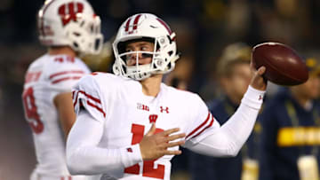 ANN ARBOR, MI - OCTOBER 13: Alex Hornibrook #12 of the Wisconsin Badgers throws a pass during warmups prior to playing the Michigan Wolverines on October 13, 2018 at Michigan Stadium in Ann Arbor, Michigan. (Photo by Gregory Shamus/Getty Images)