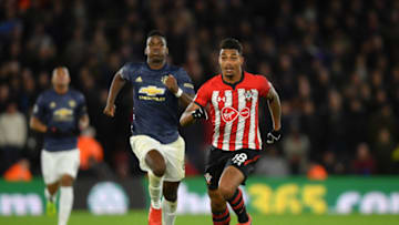 SOUTHAMPTON, ENGLAND - DECEMBER 01: Mario Lemina of Southampton runs with the ball under pressure from Paul Pogba of Manchester United during the Premier League match between Southampton FC and Manchester United at St Mary's Stadium on December 1, 2018 in Southampton, United Kingdom. (Photo by Mike Hewitt/Getty Images)