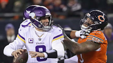 CHICAGO, IL - NOVEMBER 18: Kirk Cousins #8 of the Minnesota Vikings passes under pressure from Roy Robertson-Harris #95 of the Chicago Bears at Soldier Field on November 18, 2018 in Chicago, Illinois. The Bears defeated the Vikings 25-20. (Photo by Jonathan Daniel/Getty Images)