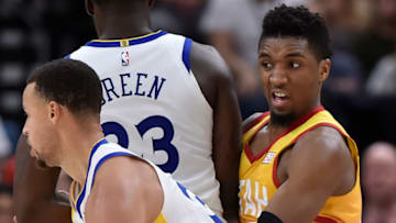 SALT LAKE CITY, UT - DECEMBER 19: Donovan Mitchell #45 of the Utah Jazz eyes Stephen Curry #30 of the Golden State Warriors in a NBA game at Vivint Smart Home Arena on December 19, 2018 in Salt Lake City, Utah. NOTE TO USER: User expressly acknowledges and agrees that, by downloading and or using this photograph, User is consenting to the terms and conditions of the Getty Images License Agreement. (Photo by Gene Sweeney Jr./Getty Images)