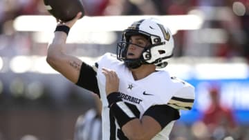 ATHENS, GA - OCTOBER 15: AJ Swann #13 of the Vanderbilt Commodores attempts to throw a pass against the Georgia Bulldogs during the first quarter at Sanford Stadium on October 15, 2022 in Athens, Georgia. (Photo by Adam Hagy/Getty Images)