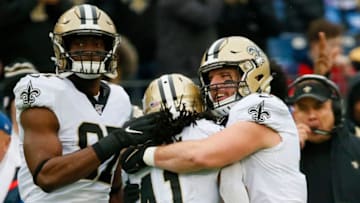 NASHVILLE, TENNESSEE - DECEMBER 22: Quarterback Drew Brees #9 of the New Orleans Saints celebrates the touchdown of running back Alvin Kamara #41 of the New Orleans Saints during the third quarter against Tennessee Titans in the game at Nissan Stadium on December 22, 2019 in Nashville, Tennessee. (Photo by Frederick Breedon/Getty Images)