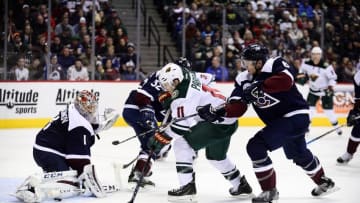 Mar 26, 2016; Denver, CO, USA; Minnesota Wild left wing Zach Parise (11) attempts to score on Colorado Avalanche goalie Semyon Varlamov (1) as defenseman Erik Johnson (6) defends from behind in the third period at the Pepsi Center. The Wild defeated the Avalanche 4-0. Mandatory Credit: Ron Chenoy-USA TODAY Sports