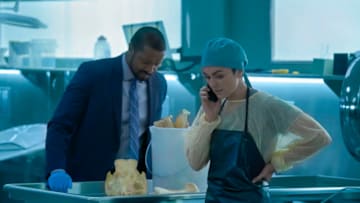 Coroner -- "All's Well" -- Image Number: COR105_1007r.jpg -- Pictured (L-R): Roger Cross as Detective Donovan "Mac" McAvoy and Serinda Swan as Dr. Jenny Cooper -- Photo: © 2020 Muse Entertainment Enterprises, Inc.
