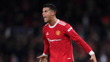 MANCHESTER, ENGLAND - SEPTEMBER 29: Cristiano Ronaldo of Manchester United celebrates victory on the final whistle after scoring a stoppage time winner during the UEFA Champions League group F match between Manchester United and Villarreal CF at Old Trafford on September 29, 2021 in Manchester, England. (Photo by Laurence Griffiths/Getty Images)