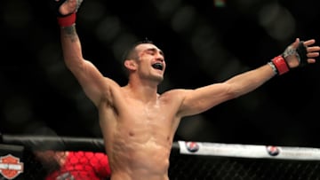 LAS VEGAS, NV - DECEMBER 06: Tony Ferguson celebrates after defeating Abel Trujillo in their fight during the UFC 181 event at the Mandalay Bay Events Center on December 6, 2014 in Las Vegas, Nevada. (Photo by Alex Trautwig/Getty Images)