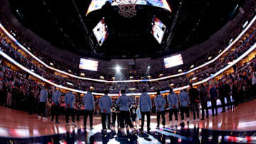 MEMPHIS, TN - MARCH 24: The Memphis Grizzlies honor the National Anthem before the game against the Los Angeles Lakers on March 24, 2018 at FedExForum in Memphis, Tennessee. NOTE TO USER: User expressly acknowledges and agrees that, by downloading and or using this photograph, User is consenting to the terms and conditions of the Getty Images License Agreement. Mandatory Copyright Notice: Copyright 2018 NBAE (Photo by Joe Murphy/NBAE via Getty Images)
