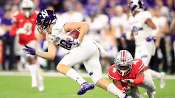 INDIANAPOLIS, INDIANA - DECEMBER 01: Bennett Skowronek #88 of the Northwestern Wildcats escapes a tackle from Jordan Fuller #4 of the Ohio State Buckeyes in the second quarter at Lucas Oil Stadium on December 01, 2018 in Indianapolis, Indiana. (Photo by Andy Lyons/Getty Images)