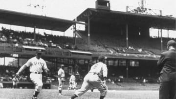 WASHINGTON, DC - CIRCA 1940: Josh Gibson, catcher for the Negro League Homestead Grays, is approaching first base as he runs out a ground ball in Griffith Stadium circa 1940 in Washington, D.C. (Photo Reproduction by Transcendental Graphics/Getty Images)
