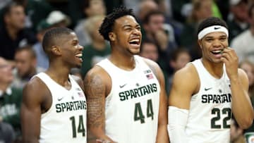 Jan 4, 2017; East Lansing, MI, USA; Michigan State Spartans guard Eron Harris (14) and Michigan State Spartans forward Nick Ward (44) and Michigan State Spartans guard Miles Bridges (22) laugh on the bench during the second half of a game against the Rutgers Scarlet Knights at the Jack Breslin Student Events Center. Mandatory Credit: Mike Carter-USA TODAY Sports
