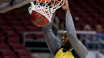 Mar 23, 2016; Louisville, KY, USA; Maryland Terrapins forward Robert Carter (4) dunks the ball during practice the day before the semifinals of the South regional of the NCAA Tournament at KFC YUM!. Mandatory Credit: Peter Casey-USA TODAY Sports
