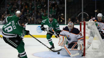 DALLAS, TEXAS - DECEMBER 03: Tyler Pitlick #18 of the Dallas Stars takes a shot against Mikko Koskinen #19 of the Edmonton Oilers in the third period at American Airlines Center on December 03, 2018 in Dallas, Texas. (Photo by Ronald Martinez/Getty Images)