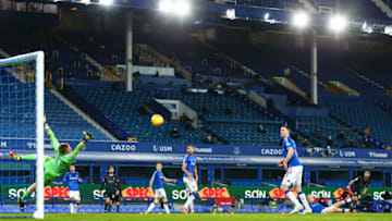 LIVERPOOL, ENGLAND - FEBRUARY 17: Riyad Mahrez of Manchester City scores a goal to make it 1-2 during the Premier League match between Everton and Manchester City at Goodison Park on February 17, 2021 in Liverpool, United Kingdom. Sporting stadiums around the UK remain under strict restrictions due to the Coronavirus Pandemic as Government social distancing laws prohibit fans inside venues resulting in games being played behind closed doors. (Photo by Robbie Jay Barratt - AMA/Getty Images)