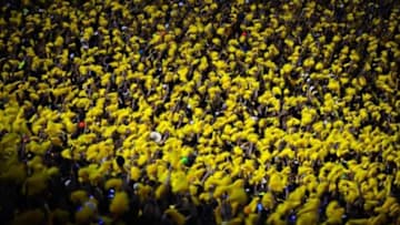 Sep 7, 2013; Ann Arbor, MI, USA; Michigan Wolverines fans cheer during the first quarter against the Notre Dame Fighting Irish at Michigan Stadium. Mandatory Credit: Andrew Weber-USA TODAY Sports