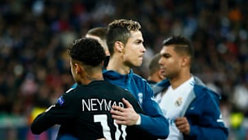 MADRID, SPAIN - FEBRUARY 14: Cristiano Ronaldo (L) of Real Madrid CF hugs Neymar JR (R) of Paris Saint-Germain prior to start the UEFA Champions League Round of 16 First Leg match between Real Madrid and Paris Saint-Germain at Estadio Santiago Bernabeu on February 14, 2018 in Madrid, Spain. (Photo by Gonzalo Arroyo Moreno/Getty Images)