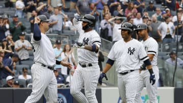 Daily Fantasy Baseball Picks: NEW YORK, NEW YORK - JUNE 19: Gleyber Torres #25 of the New York Yankees celebrates his seventh inning grand slam home run against the Tampa Bay Rays with teammates Gary Sanchez #24 (L), Edwin Encarnacion #30 (2nd R) and Aaron Hicks #31 (R) at Yankee Stadium on June 19, 2019 in New York City. (Photo by Jim McIsaac/Getty Images)