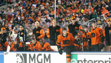 PHILADELPHIA, PA - FEBRUARY 23: Members of the Philadelphia Flyers watch the play on the ice from their bench against the Pittsburgh Penguins at the 2019 Coors Light NHL Stadium Series on February 23, 2019 at Lincoln Financial Field in Philadelphia, Pennsylvania. (Photo by Len Redkoles/NHLI via Getty Images)