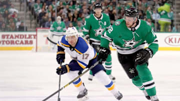 DALLAS, TX - FEBRUARY 21: Radek Faksa #12 of the Dallas Stars controls the puck against Jaden Schwartz #17 of the St. Louis Blues in the first period at American Airlines Center on February 21, 2019 in Dallas, Texas. (Photo by Tom Pennington/Getty Images)