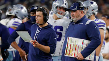 ARLINGTON, TEXAS - DECEMBER 26: Dallas Cowboys Offensive Coordinator Kellen Moore and Head coach Mike McCarthy of the Dallas Cowboys look on during the first half against the Washington Football Team at AT&T Stadium on December 26, 2021 in Arlington, Texas. (Photo by Richard Rodriguez/Getty Images)