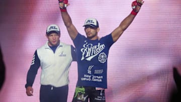 UNCASVILLE, CT - APRIL 22: Bellator welterweight champion Andrey Koreshkov walks to the cage for his bout against Benson Henderson (not shown) at Mohegan Sun Arena on April 22, 2016 in Uncasville, Connecticut. (Photo by Ed Mulholland/Getty Images)