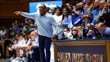 Hubert Davis coaches against the Duke basketball program (Photo by Jared C. Tilton/Getty Images)
