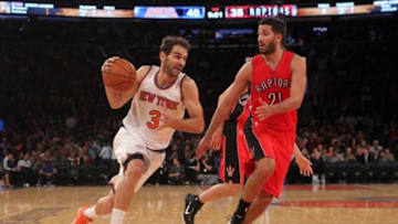 Oct 13, 2014; New York, NY, USA; New York Knicks point guard Jose Calderon (3) drives on Toronto Raptors point guard Greivis Vasquez (21) during the third quarter at Madison Square Garden. Mandatory Credit: Brad Penner-USA TODAY Sports