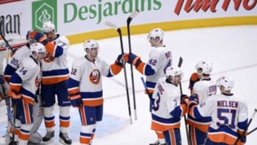 Apr 10, 2014; Montreal, Quebec, CAN; The New York Islanders celebrate their victory over the Montreal Canadiensduring at the Bell Centre. Mandatory Credit: Eric Bolte-USA TODAY Sports