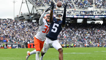Oct 23, 2021; University Park, Pennsylvania, USA; Illinois Fighting Illini defensive back Devon Witherspoon (31) breaks up a pass intended for Penn State Nittany Lions wide receiver Jahan Dotson (5) during overtime at Beaver Stadium. Mandatory Credit: Rich Barnes-USA TODAY Sports