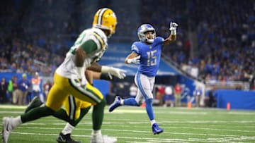 Wide receiver Golden Tate #15 of the Detroit Lions throws a two point conversion pass to quarterback Matthew Stafford #9 of the Detroit Lions against the Green Bay Packers during the fourth quarterat Ford Field on December 31, 2017 in Detroit, Michigan. (Photo by Gregory Shamus/Getty Images)