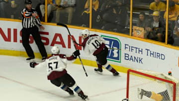 NASHVILLE, TN - APRIL 20: Colorado Avalanche left wing Gabriel Bourque #57 celebrates with Colorado Avalanche right wing Sven Andrighetto #10 who scored the game winning goal against Nashville Predators goaltender Pekka Rinne #35 in the third period of game 5 of round one of the Stanley Cup Playoffs at Bridgestone Arena April 20, 2018. Nashville Predators left wing Scott Hartnell #17 tried to defend. The Avalanche won 2-1. (Photo by Andy Cross/The Denver Post via Getty Images)