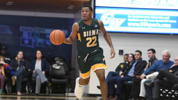 WASHINGTON, DC - NOVEMBER 08: Jalen Pickett #22 of the Siena Saints dribbles up court during a college basketball game against the George Washington Colonials at the Smith Center on November 8, 2018 in Washington, DC. (Photo by Mitchell Layton/Getty Images)