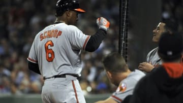 Jun 14, 2016; Boston, MA, USA; Baltimore Orioles second baseman Jonathan Schoop (6) is greeted in the dugout after hitting a home run during the eighth inning against the Boston Red Sox at Fenway Park. Mandatory Credit: Bob DeChiara-USA TODAY Sports
