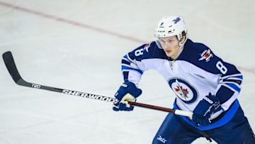 Mar 16, 2016; Calgary, Alberta, CAN; Winnipeg Jets defenseman Jacob Trouba (8) skates against the Calgary Flames during the second period at Scotiabank Saddledome. Calgary Flames won 4-1. Mandatory Credit: Sergei Belski-USA TODAY Sports