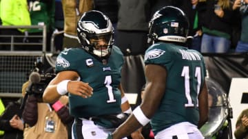 Jan 21, 2023; Philadelphia, Pennsylvania, USA; Philadelphia Eagles quarterback Jalen Hurts (1) celebrates his touchdown with wide receiver A.J. Brown (11) during the second quarter against the New York Giants during an NFC divisional round game at Lincoln Financial Field. Mandatory Credit: Eric Hartline-USA TODAY Sports