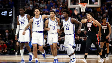 Duke basketball teammates Paolo Banchero, Mark Williams, AJ Griffin, and Wendell Moore (Photo by Ezra Shaw/Getty Images)