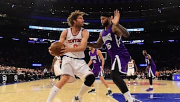 Mar 20, 2016; New York, NY, USA; New York Knicks center Robin Lopez (8) is defended by Sacramento Kings center DeMarcus Cousins (15) during the fourth quarter at Madison Square Garden. The Sacramento Kings defeated the New York Knicks 88-80. Mandatory Credit: Steven Ryan-USA TODAY Sports