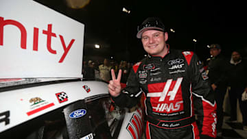 RICHMOND, VA - APRIL 12: Cole Custer, driver of the #00 Haas Automation Ford, poses with the winners sticker after winning the NASCAR Xfinity Series ToyotaCare 250 at Richmond Raceway on April 12, 2019 in Richmond, Virginia. (Photo by Matt Sullivan/Getty Images)