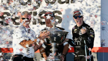 SONOMA, CA - SEPTEMBER 17: Josef Newgarden of the United States driver of the #2 hum by Verizon Chevrolet celebrates with team owner Roger Penske after bing presented with the Astor Cup for winning the 2017 Verizon IndyCar Series on day 3 of the GoPro Grand Prix of Sonoma at Sonoma Raceway on September 17, 2017 in Sonoma, California. (Photo by Lachlan Cunningham/Getty Images)