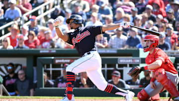 GOODYEAR, ARIZONA - MARCH 03: Francisco Lindor #12 of the Cleveland Indians follows through on a swing against the Los Angeles Angels during a spring training game at Goodyear Ballpark on March 03, 2020 in Goodyear, Arizona. (Photo by Norm Hall/Getty Images)