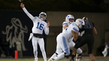 SALT LAKE CITY, UT - NOVEMBER 2 : Baylor Romney #16 of the BYU Cougars throws a pass during their game against the Utah State Aggies at Maverick Stadium on November 2, 2019 in Logan, Utah. (Photo by Chris Gardner/Getty Images)