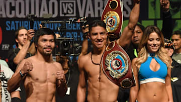 LAS VEGAS, NV - NOVEMBER 04: Manny Pacquiao (L) and WBO welterweight champion Jessie Vargas pose during their official weigh-in at the Encore Theater at Wynn Las Vegas on November 4, 2016 in Las Vegas, Nevada. Vargas will defend his title against Pacquiao on November 5 at the Thomas